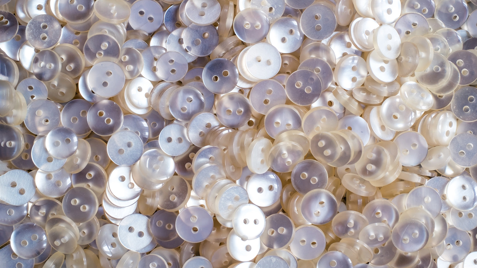 Button Up Your Style: Why Mother of Pearl Buttons Are a Must-Have for Custom Menswear